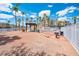 Inviting community space featuring a covered picnic area, pool access, and lush palm trees at 2048 Mesquite Ln # 303, Laughlin, NV 89029