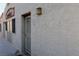 Exterior shot of the building's facade with a textured finish and a well-lit entrance at 2048 Mesquite Ln # 303, Laughlin, NV 89029