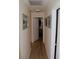 Hallway with light wood floor, neutral walls, and access to other rooms at 2048 Mesquite Ln # 303, Laughlin, NV 89029