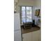 Kitchen appliances and decor next to a window with blinds at 2048 Mesquite Ln # 303, Laughlin, NV 89029