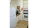 Cozy kitchen with white appliances and ample cabinet space at 2048 Mesquite Ln # 303, Laughlin, NV 89029
