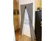 Convenient laundry area with stacked washer and dryer hidden behind a space-saving curtain at 2048 Mesquite Ln # 303, Laughlin, NV 89029