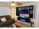 Contemporary living room featuring a modern entertainment center, comfortable seating, and ambient lighting at 2048 Mesquite Ln # 303, Laughlin, NV 89029