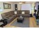 Comfortable living room with a large sectional sofa, modern decor, and light hardwood floors at 2048 Mesquite Ln # 303, Laughlin, NV 89029