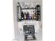 Close-up of wet bar with sink, shelving, and storage for bottles and glassware at 2048 Mesquite Ln # 303, Laughlin, NV 89029