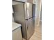 Modern stainless steel refrigerator in a kitchen featuring contemporary design elements and ample storage at 205 E Harmon Ave # 212, Las Vegas, NV 89169