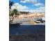 Outside the condo is a view from the balcony overlooking new development and construction at 205 E Harmon Ave # 212, Las Vegas, NV 89169