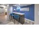 Stylish bar area featuring a sleek countertop, comfortable seating, and modern decor at 2232 Barchetta Dr, Las Vegas, NV 89134