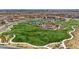 Overhead shot of a sprawling community park featuring walking trails, lush greenery and recreational amenities at 2232 Barchetta Dr, Las Vegas, NV 89134