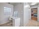 Hallway featuring a vanity, good lighting, and a clear view of the main bedroom at 2232 Barchetta Dr, Las Vegas, NV 89134