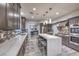Spacious kitchen with stainless steel appliances, a large island, and stylish countertops at 2232 Barchetta Dr, Las Vegas, NV 89134