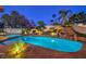Beautiful pool and spa with lush landscaping at 2232 Barchetta Dr, Las Vegas, NV 89134