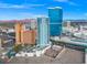 Stunning aerial view of a resort featuring high-rise buildings, swimming pool, and parking area at 2700 Las Vegas Blvd # 1301, Las Vegas, NV 89109