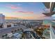Sweeping aerial view showcases the vibrant cityscape, nearby parking, and lush landscaping at 2700 Las Vegas Blvd # 1301, Las Vegas, NV 89109
