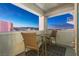 Balcony seating offers city views, with an outdoor table and chairs for relaxing and enjoying the skyline at 2700 Las Vegas Blvd # 1301, Las Vegas, NV 89109