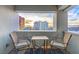 Balcony seating offers city views, with an outdoor table and chairs for relaxing and enjoying the skyline at 2700 Las Vegas Blvd # 1301, Las Vegas, NV 89109