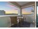 Private balcony with seating offers breathtaking mountain and city views at sunset at 2700 Las Vegas Blvd # 1301, Las Vegas, NV 89109