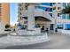 Elegant building entrance with tiered fountain and landscaping providing a grand welcome for guests at 2700 Las Vegas Blvd # 1301, Las Vegas, NV 89109