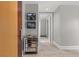 Modern hallway featuring sleek gray walls and recessed lighting, leading to the entryway and other rooms at 2700 Las Vegas Blvd # 1301, Las Vegas, NV 89109