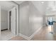 Long hallway with wood flooring and recessed lighting, offering views into the living room at 2700 Las Vegas Blvd # 1301, Las Vegas, NV 89109