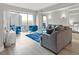 Bright living room with city views, hardwood floors, comfortable seating, and modern decor at 2700 Las Vegas Blvd # 1301, Las Vegas, NV 89109