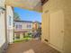 Outdoor balcony with wood flooring, metal railing, and views of the neighborhood at 2801 N Rainbow Blvd # 238, Las Vegas, NV 89108