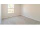 Cozy bedroom featuring carpeted flooring, base trim, and a window providing natural light at 2801 N Rainbow Blvd # 238, Las Vegas, NV 89108