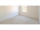 Comfortable carpeted bedroom featuring a window that brings in natural light at 2801 N Rainbow Blvd # 238, Las Vegas, NV 89108