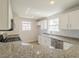 Modern kitchen with granite countertops, stainless steel appliances, and ample natural light at 2801 N Rainbow Blvd # 238, Las Vegas, NV 89108