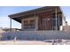 Architectural view of the Ice Age Fossils State Park building with modern design and desert landscaping at 3725 Moonshine Falls Ave, North Las Vegas, NV 89085