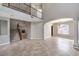 Elegant foyer with staircase and chandelier, offering a grand entrance to the home at 3725 Moonshine Falls Ave, North Las Vegas, NV 89085