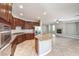 Gourmet kitchen with stainless steel appliances and center island at 3725 Moonshine Falls Ave, North Las Vegas, NV 89085