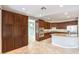 Spacious kitchen with stainless steel appliances, granite counters, and large island with sink at 3725 Moonshine Falls Ave, North Las Vegas, NV 89085