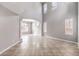 Bright, open living room with high ceilings and abundant natural light creates an inviting atmosphere at 3725 Moonshine Falls Ave, North Las Vegas, NV 89085