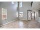 Bright, open living room with abundant natural light and tile flooring creates an inviting atmosphere at 3725 Moonshine Falls Ave, North Las Vegas, NV 89085