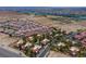 Aerial view of a well-planned community with numerous townhomes and a nearby river at 3740 Desert Marina Dr # 7, Laughlin, NV 89029
