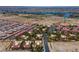 Aerial view of a community shows residences, and a waterway in the distance at 3740 Desert Marina Dr # 7, Laughlin, NV 89029
