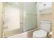 Bright bathroom featuring a shower-over-tub with glass doors and built-in storage at 3740 Desert Marina Dr # 7, Laughlin, NV 89029