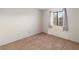 Light filled bedroom featuring wall-to-wall carpet and natural light at 3740 Desert Marina Dr # 7, Laughlin, NV 89029