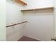 Walk-in closet offers ample storage space with multiple shelves and clothing rods at 3740 Desert Marina Dr # 7, Laughlin, NV 89029