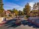 Exterior view of the gated entrance to Laughlin Bay Village, featuring well-manicured landscaping at 3740 Desert Marina Dr # 7, Laughlin, NV 89029