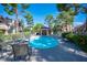 Community pool area with comfortable lounge seating at Laughlin Bay Village at 3740 Desert Marina Dr # 7, Laughlin, NV 89029