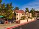 Exterior view of the Laughlin Bay Village community, showcasing the building's architecture and landscaping at 3740 Desert Marina Dr # 7, Laughlin, NV 89029