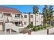 Inviting condo exterior with private balconies, well-maintained landscaping, and desert community charm at 3740 Desert Marina Dr # 7, Laughlin, NV 89029