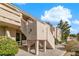 Charming condo exterior featuring private balcony, updated landscaping, and well-maintained building design at 3740 Desert Marina Dr # 7, Laughlin, NV 89029