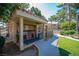 Outdoor grill area offers built-in barbecues and seating, ideal for hosting cookouts at 3740 Desert Marina Dr # 7, Laughlin, NV 89029