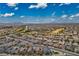 Expansive aerial view of a neighborhood in Las Vegas with distant mountain views at 3909 Grazing Gazelle Ave, North Las Vegas, NV 89084