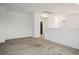 Open loft area with neutral carpet, offering versatile space for relaxation or entertainment at 3909 Grazing Gazelle Ave, North Las Vegas, NV 89084