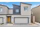 Modern two-story home with a two-car garage and a contemporary exterior design at 4125 Venus Falls Ave, North Las Vegas, NV 89084