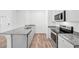 Modern kitchen featuring granite countertops and stainless steel appliances at 4125 Venus Falls Ave, North Las Vegas, NV 89084